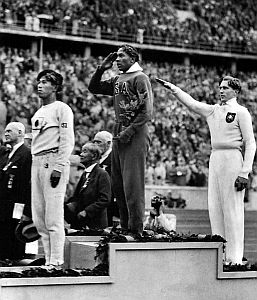 Jesse Owens on the podium in 1936 Summer Olympics in Berlin.