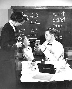 Vintage Photo: Doctor examining child's throat.