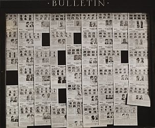 'Bulletin Board in Post Office' by Russell Lee.