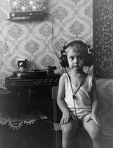 Child listening to music.